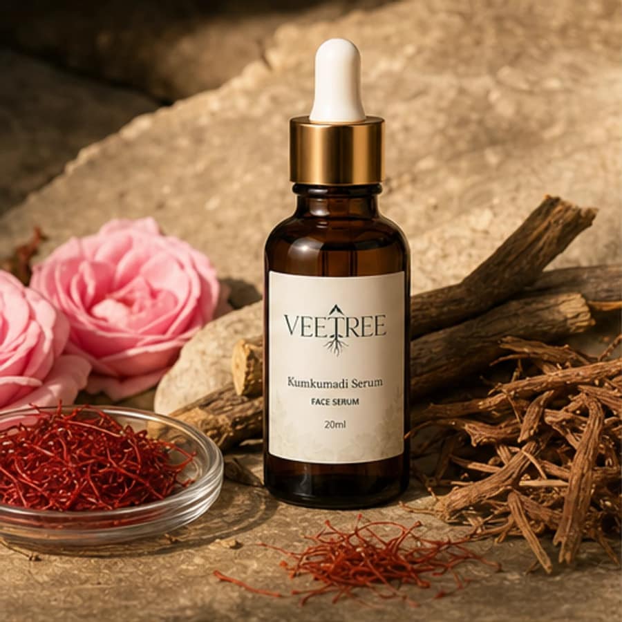 Kumkumadi Serum arranged with its featured botanical ingredients