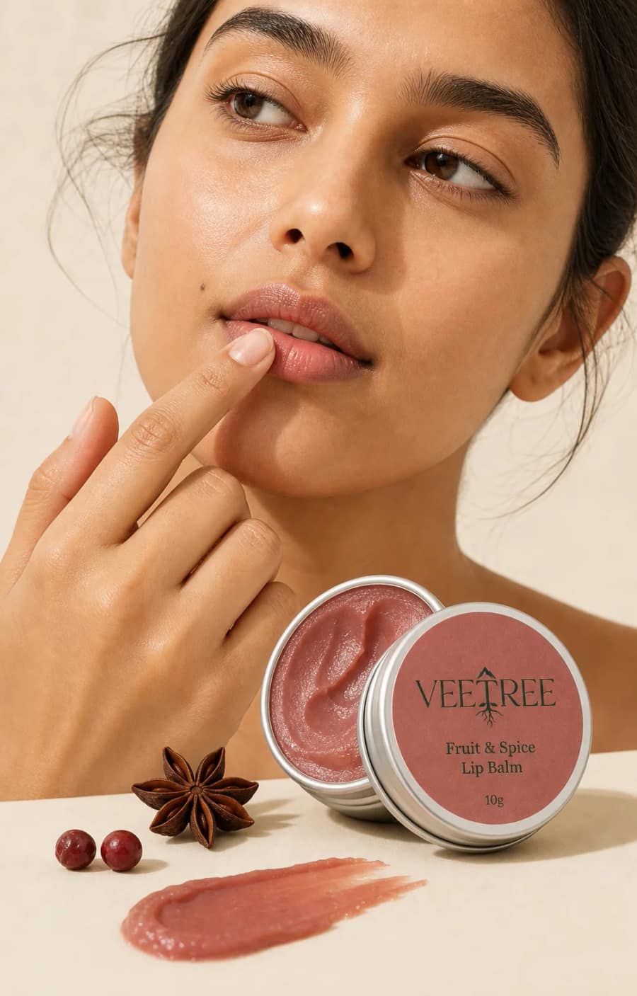Fruit & Spice Lip Balm texture and application shown in a VEETREE studio photograph