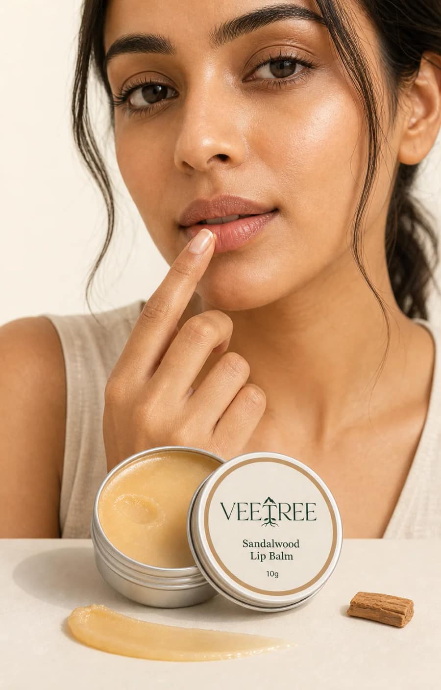 Sandalwood Lip Balm texture and application shown in a VEETREE studio photograph